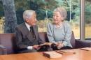 Japan's Emperor Akihito and Empress Michiko read a book at the Imperial Palace in Tokyo