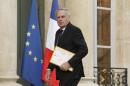 French Foreign Minister Jean-Marc Ayrault arrives to attend a defence council at the Elysee Palace in Paris