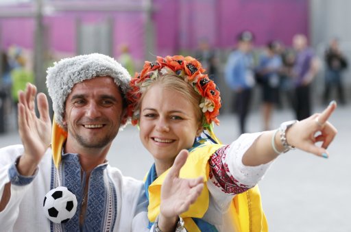 Ukraine fans cheer before their Group D Euro 2012 soccer match against England at the Donbass Arena in Donetsk