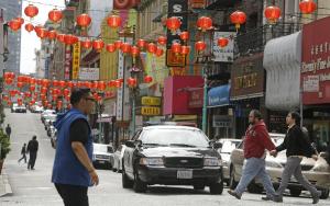 San Francisco police patrol the Chinatown district …
