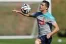 Cristiano Ronaldo controls the ball during a training session of Portugal in Campinas, Brazil, Friday, June 20, 2014. Portugal plays in group G of the Brazil 2014 soccer World Cup. (AP Photo/Paulo Duarte)