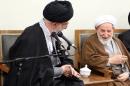 Ayatollah Mohammad Yazdi (right) says Iran's nuclear agreement with world powers should not "change our foreign policy" of opposition to the United States
