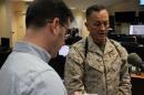 US Brigadier General Rick Uribe talks to reporters in Baghdad's Joint Operations Center, while US military officials give a quick glimpse of the US-led coalition war against the Islamic State group