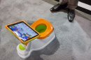 The iPotty for iPad potty training device is see on display at the Consumer Electronics Show, Wednesday, Jan. 9, 2013, in Las Vegas. No app is available to go with the trainer, but the idea is to keep the child on the toilet for as long as necessary by keeping them digitally entertained. (AP Photo/Julie Jacobson)