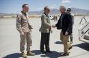 U.S. Defense Secretary Chuck Hagel, right, is greeted by U.S. Ambassador to Afghanistan James Cunningham, center, and Marine General Joseph Dunford, left, commander of the US-led International Security Assistance Force (ISAF), during his arrival to Bagram Airfield in Afghanistan, Sunday, June 1, 2014. (AP Photo/Pablo Martinez Monsivais, POOL)
