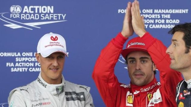 Alonso y Michael Schumacher en el podio de Silverstone tras la calificación