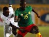 Cameroon's Webo is challenged by Democratic Republic of Congo's Tshiolola during their African Nations Cup in Cairo