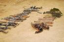 Handout picture released by the Nigerian army on April 30, 2015, from an undisclosed location in the Sambisa Forest, Borno state, purportedly shows weapons and ammunitions seized in an operation against the Islamist group Boko Haram