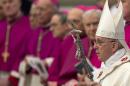 Pope Francis arrives to celebrate a Mass in St. Peter's Basilica at the Vatican, Wednesday, Jan. 1, 2014. (AP Photo/Andrew Medichini)