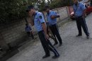Georgian police block the street in the village of Lapankuri, some 175 km east of Tbilis