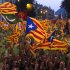 FILE - Demonstrators wave Catalan flags during a protest rally in Barcelona , Spain, in this Tuesday, Sept. 11, 2012 file photo. Thousands of people demonstrated in Barcelona on Tuesday demanding independence for Catalonia, on the Catalonia region's 'National Day". On Thursday, regional lawmakers voted to hold a referendum for Catalonia's seven million citizens to decide whether they want to break away from Spain. The Spanish government says that the referendum would be unconstitutional. And it's unclear if the "Yes" vote would win — even in these restless times. But it looks more likely than ever that Catalonia may ask to go its own way. (AP Photo/Emilio Morenatti, File)