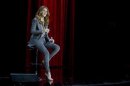 Singer Celine Dion listens to a question from a reporter following her opening night performance at the Colosseum at Caesars Palace in Las Vegas