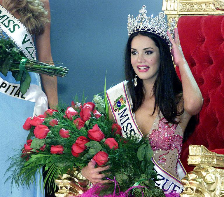 Monica Spear poses after being elected Miss Venezuela, in Caracas, on September 23, 2004