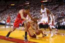 El campeón Miami Heat le dio la vuelta al partido para derrotar 94-91 a Chicago Bulls el 15 de mayo de 2013