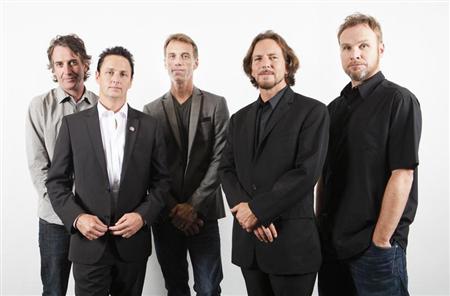 Members of the band Pearl Jam (L-R), Stone Gossard, Mike McCready, Matt Cameron, Eddie Vedder, and Jeff Ament of the film "Pearl Jam Twenty" pose during the 36th Toronto International Film Festival (TIFF) in Toronto, September 10, 2011. REUTERS/Mark Blinch