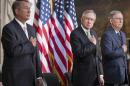 Senate Majority Leader Harry Reid, House Speaker John Boehner, Senate Republican Leader Mitch McConnell stand at a ceremony to posthumously present the Congressional Gold Medal to Raoul Wallenberg in Washington