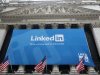 Banner announcing Linkedin Inc. listing on the New York Stock Exchange hangs on Exchange in New York