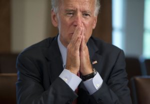 Vice President Joe Biden listens as President Barack …