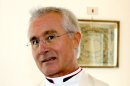 An undated photo of Monsignor Nunzio Scarano in Salerno, Italy. A Vatican official already under investigation in a purported money-laundering plot involving the Vatican bank was arrested Friday, June 28, 2013, in a separate operation: Prosecutors allege he tried to bring 20 million euros ($26 million) in cash into Italy from Switzerland aboard an Italian government plane, his lawyer said. Monsignor Nunzio Scarano, a recently suspended accountant in one of the Vatican's main financial departments, is accused of fraud, corruption and slander stemming from the plot, which never got off the ground, attorney Silverio Sica told The Associated Press. He said Scarano was a middleman in the operation: Friends had asked him to intervene with a broker, Giovanni Carenzio, to return 20 million euros they had given him to invest. Sica said Scarano persuaded Carenzio to return the money, and an Italian secret service agent, Giovanni Maria Zito, went to Switzerland to bring the cash back aboard an Italian government aircraft. Such a move would presumably prevent any reporting of the money coming into Italy. The operation failed because Carenzio reneged on the deal, Sica said. (AP Photo/Francesco Pecoraro)
