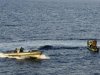 Marines from NATO's Turkish frigate Gediz arrest suspected pirates on their skiff in the Gulf of Aden