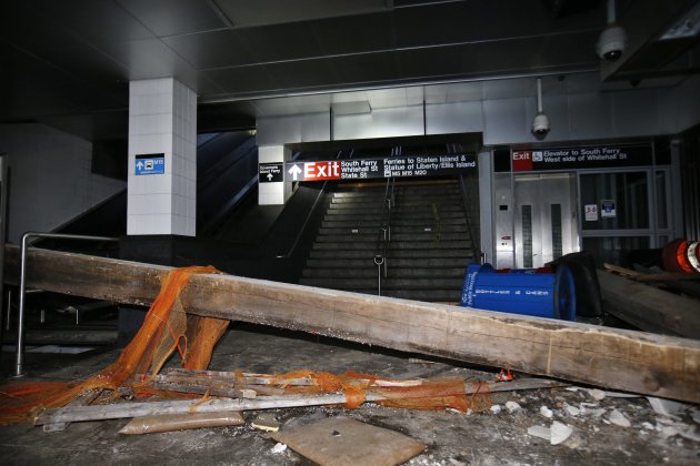 A massive wooden beam lays among debris at the South Ferry-Whitehall Subway Terminal in lower Manhattan