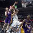 Los Angeles Lakers guard Steve Blake, left, blocks a shot by Denver Nuggets forward Danilo Gallinari, center, of Italy, as Lakers guard Kobe Bryant looks on in the fourth quarter of the Lakers' 92-88 victory in Game 4 of the teams' first-round NBA  basketball series in Denver on Sunday, May 6, 2012. (AP Photo/David Zalubowski)