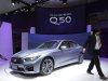 Infiniti's new Q50 is displayed at the Shanghai International Automobile Industry Exhibition (AUTO Shanghai) media day in Shanghai, China Saturday, April 20, 2013. (AP Photo/Eugene Hoshiko)