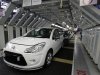 Citroen C3 automobiles are seen on the idled assembly line as striking employees prevent their colleagues from working at the PSA-Peugeot Citroen plant in Aulnay-sous-Bois