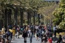 Students walk through campus between classes at Santa Monica College in Santa Monica