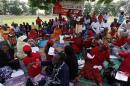 Protesters gather during a sit-in protest in support of the release of the abducted Chibok schoolgirls at the Unity Fountain in Abuja