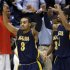 North Carolina A&T guard Jeremy Underwood (3) celebrates after they defeated Liberty 73-72 in a first round NCAA college basketball tournament game, Tuesday, March 19, 2013, in Dayton, Ohio. Underwood led North Carolina A&T with 19 points. (AP Photo/Al Behrman)