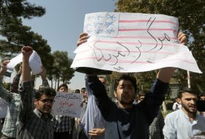 Iranian supporters of the Basiji militia hold anti-US …