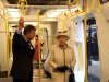 Britain's Queen Elizabeth II is shown round the carriage of a parked train at Baker Street underground station in London, for a visit to mark the 150th anniversary of the London Underground, Wednesday, March 20, 2013.  The Queen made her first public engagement in more than a week Wednesday after cancellations following her hospitalization for a stomach bug.  The British head of state joined her husband Prince Philip and their granddaughter-in-law, Kate, for the event marking the 150th anniversary of London's sprawling subway system, affectionately known as the Tube.  (AP Photo/Chris Radburn, Pool)