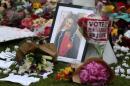 Tributes in memory of murdered Labour Party MP Jo Cox, are left at Parliament Square in London