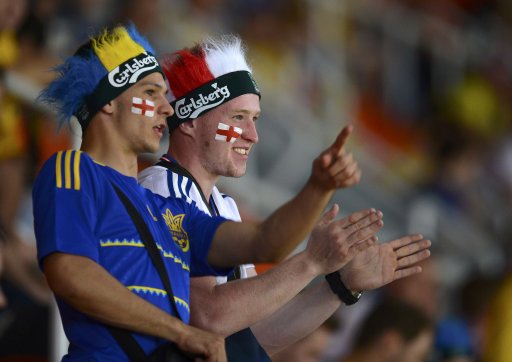 Fans of England react before their Group D Euro 2012 soccer match against Ukraine at Donbass Arena in Donetsk