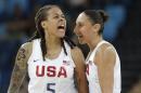 United States' Seimone Augustus (5), with teammate Diana Taurasi, reacts to a score against Japan during a women's quarterfinal round basketball game at the 2016 Summer Olympics in Rio de Janeiro, Brazil, Tuesday, Aug. 16, 2016. (AP Photo/Eric Gay)