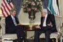US Secretary of State John Kerry meets with Palestinian President Mahmud Abbas in London on September 8, 2013