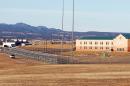 FILE PHOTO -- Patrol vehicle is seen along the fencing at the Federal Correctional Complex, including the Administrative Maximum Penitentiary or "Supermax" prison, in Florence, Colorado