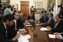 Cyprus' President Anastasiades chairs a meeting with party leaders and governor of the Central Bank of Cyprus at the presidential palace in Nicosia