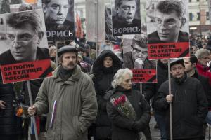 People carry portraits of opposition leader Boris Nemtsov, &hellip;