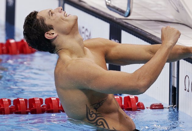 France's Florent Manaudou celebrates winning gold in the men's 50m freestyle final during the London 2012 Olympic Games at the Aquatics Centre