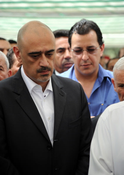 الجزائريون يلقون النظرة الأخيرة على جثمان وردة قبل دفنه 144782568-8-jpg_090814