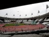 The stadium has a permanent 25,000-seater sunken athletics stadium, with a temporary 55,000-seater tier on top