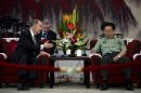 U.S. National Security Adviser Donilon speaks with General Fan, vice chairman of China's Central Military Commission, during their meeting in Beijing
