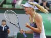 Sharapova of Russia celebrates defeating Azarenka of Belarus in their women's singles semi-final match at the French Open tennis tournament in Paris