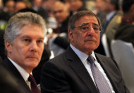 U.S. Defense Secretary Leon Panetta, right, and Australia's Defense Minister Stephen Smith, left, attend the opening session of the IISS Shangri-la Security Summit in Singapore on Friday June 1, 2012. (AP Photo/Wong Maye-E)