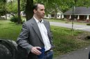 FILE - In this Tuesday April 23, 2013 file photo, Everett Dutschke stands in the street near his home in Tupelo, Miss., and waits for the FBI to arrive and search his home. Ricin has been found in a business once used by Dutschke who was charged in the case of letters laced with the deadly poison being sent to President Barack Obama, according to a court document made public Tuesday, April 30, 2013. The document also said the substance was found on items the suspect dumped in a public trash bin. (AP Photo/Northeast Mississippi Daily Journal, Thomas Wells, File) MANDATORY CREDIT: NORTHEAST MISSISSIPPI DAILY JOURNAL, THOMAS WELLS