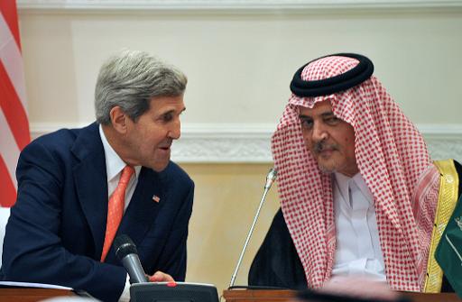 US Secretary of State John Kerry (L) speaks with Saudi Foreign Minister Prince Saud al-Faisal during a joint press conference on November 4, 2013 in Riyadh