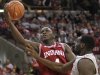 Indiana's Victor Oladipo, left, shoots over Ohio State's Evan Ravenel during the second half of an NCAA college basketball game on Sunday, Feb. 10, 2013, in Columbus, Ohio. Indiana defeated Ohio State 81-68. (AP Photo/Jay LaPrete)
