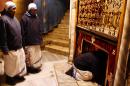 Nuns visit the Grotto in the Church of the Nativity, believed to be the birthplace of Jesus Christ